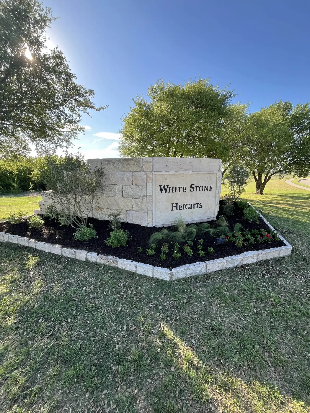 Entrance Sign after landscaping transformation by JP Landscapes in Dallas-Fort Worth